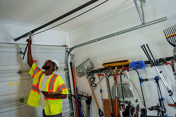 Professional Garage Door Panel Replacement technician working in Veazie, ME